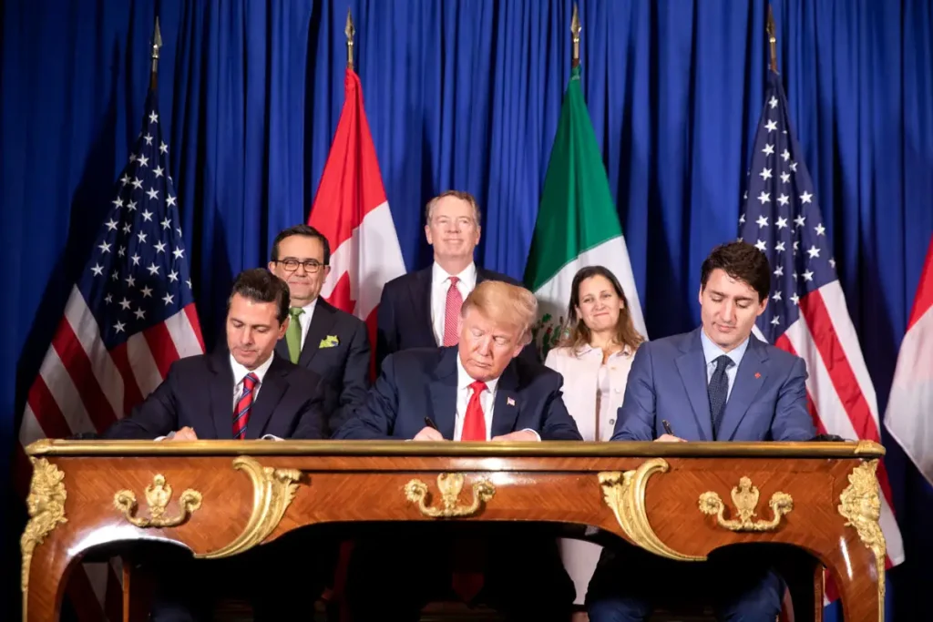 President Donald Trump (center) was joined by Mexican President Enrique Pena Nieto (left) and Canadian Prime Minister Justin Trudeau (right) at the USMCA signing ceremony Friday