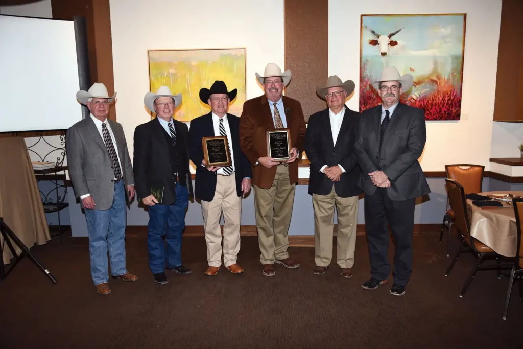 The Livestock Marketeers inducted Tim Lackey and Mark Smith to the Hall of Fame on Jan. 13. Pictured (from left) are Neil Orth