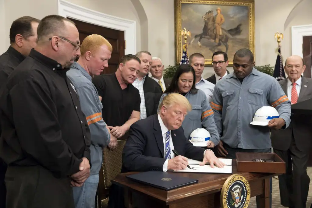 President Donald Trump signs the Section 232 Proclamations on Steel and Aluminum Imports on March 8. This proclamation created the 10 percent tariff on aluminum and 25 percent tariff on steel.