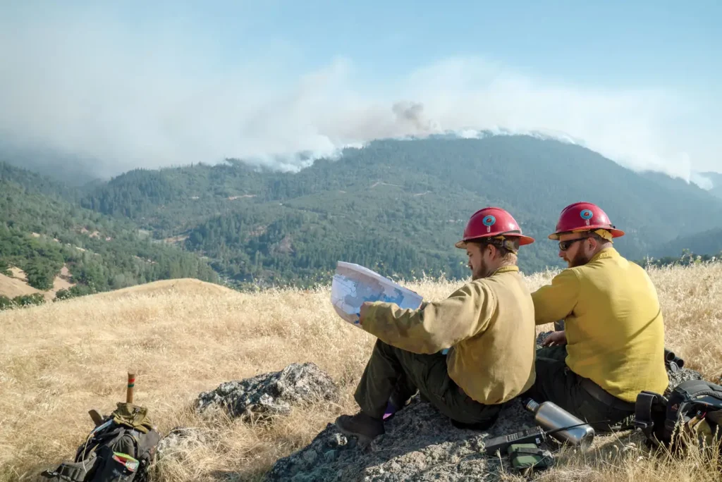 Firefighter lookouts monitor fires and train during the Mendocino Complex fire in California. The incident is comprised of two fires