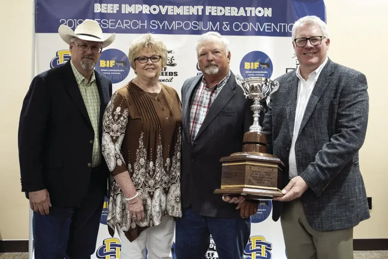Hinkson Angus Ranch was named the 2019 Beef Improvement Federation Seedstock Producer of the Year. Pictured are (from left) Burt Rutherford