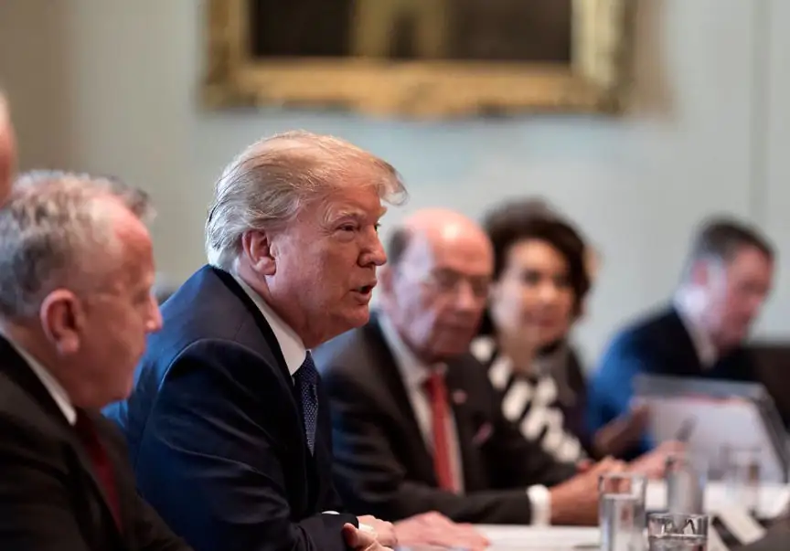 Trump speaking with his cabinet on April 9