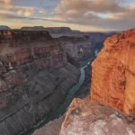 Colorado river runs through the depth of Grand Canyon